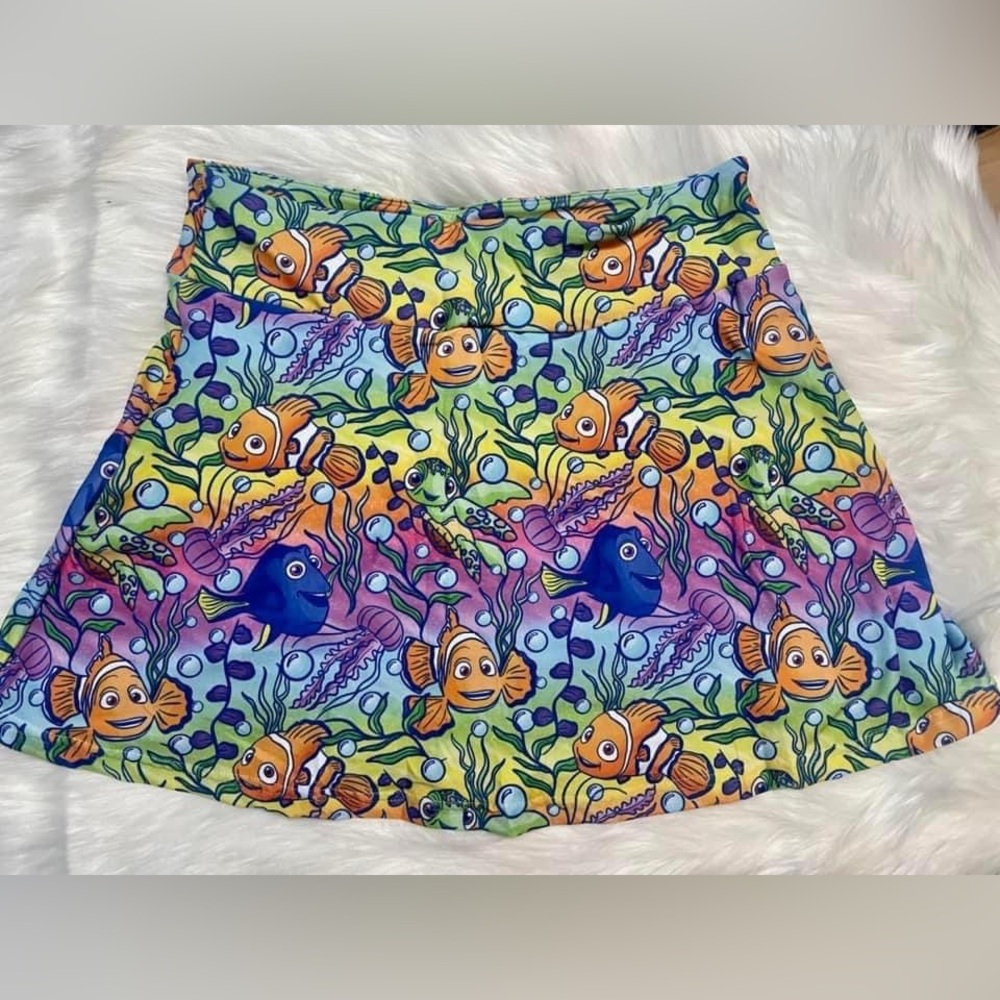 Skort. Shorts underneath have pockets. Fits Size 4-10